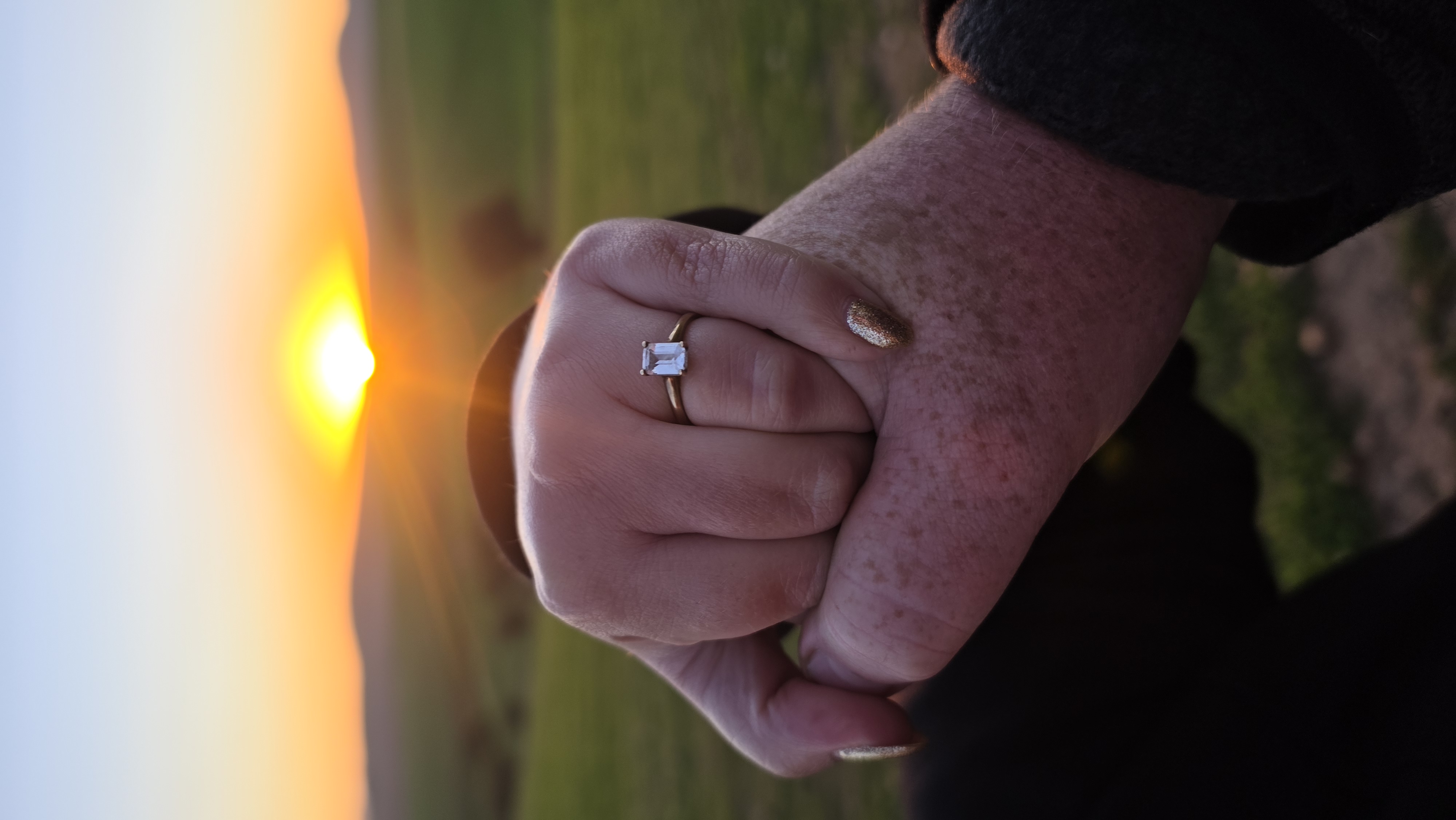 American Swiss emerald cut engagement ring with wedding band