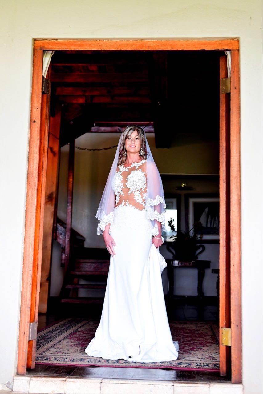 White hand embroidered wedding dress